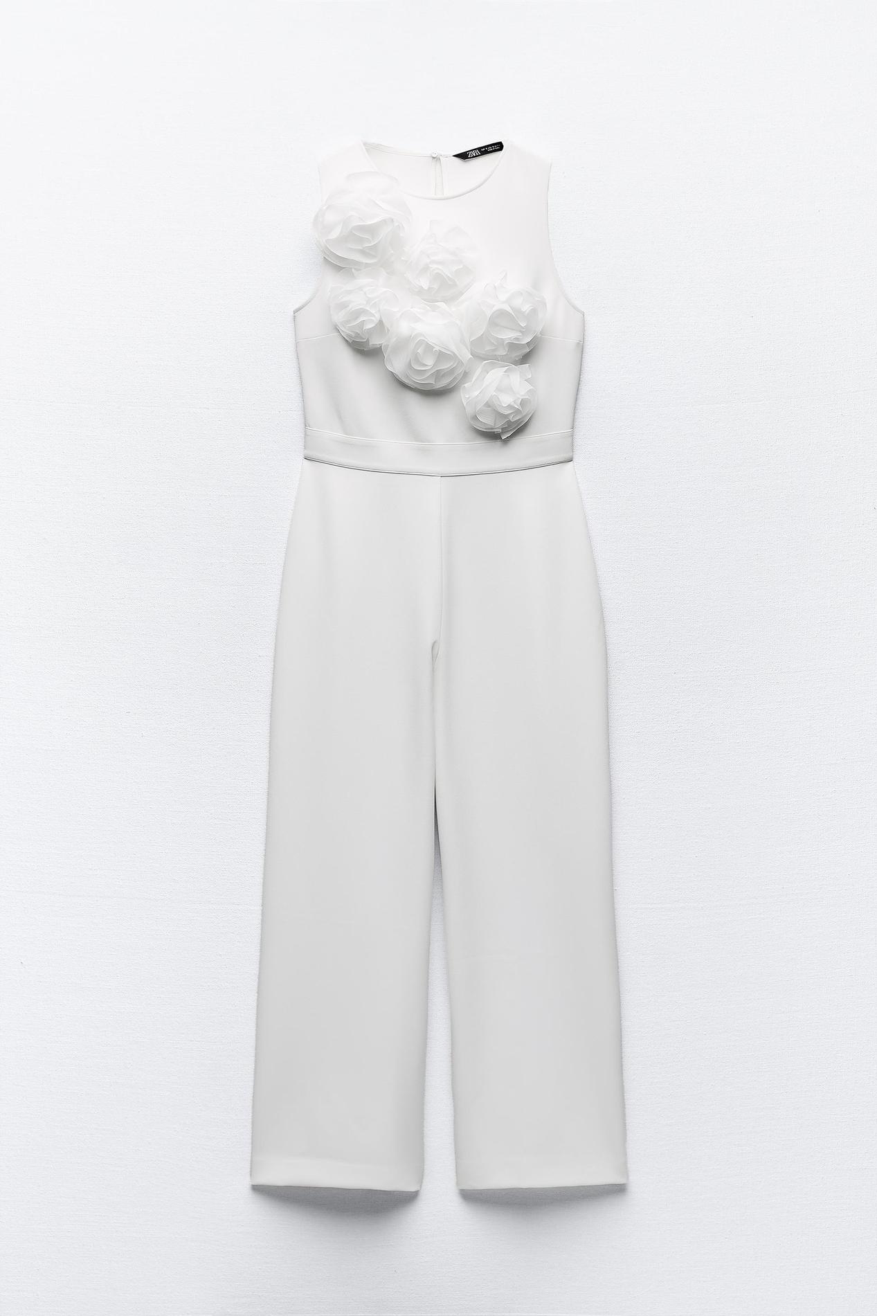 FLORAL RUFFLED CREPE JUMPSUIT offers at 149 Dhs in Zara