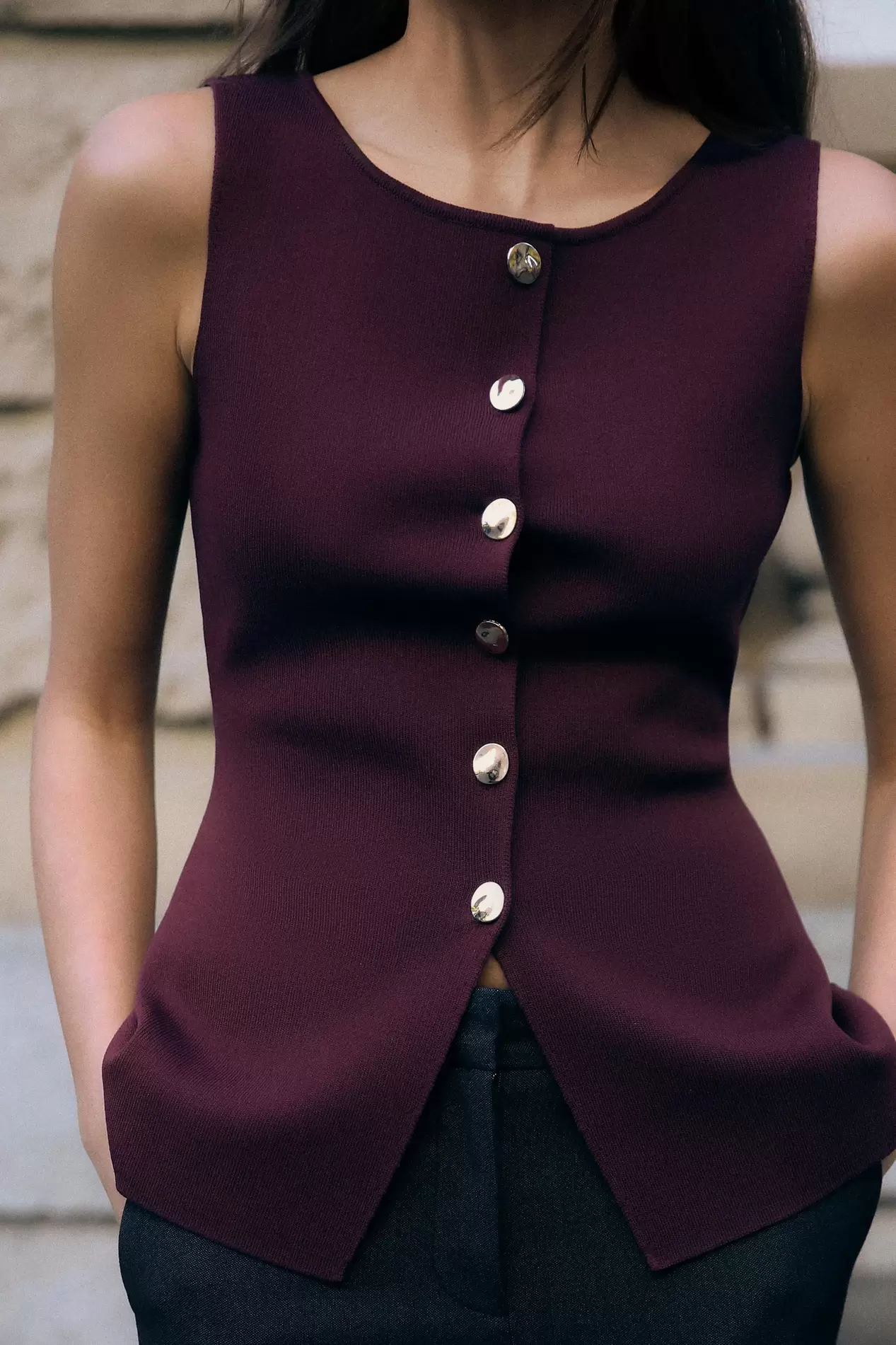 KNIT WAISTCOAT TOP WITH GOLD BUTTON offers at 179 Dhs in Zara