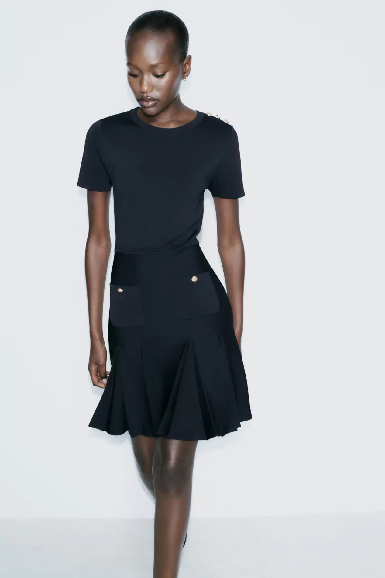 BOX PLEAT KNIT MINI DRESS offers at 269 Dhs in Zara