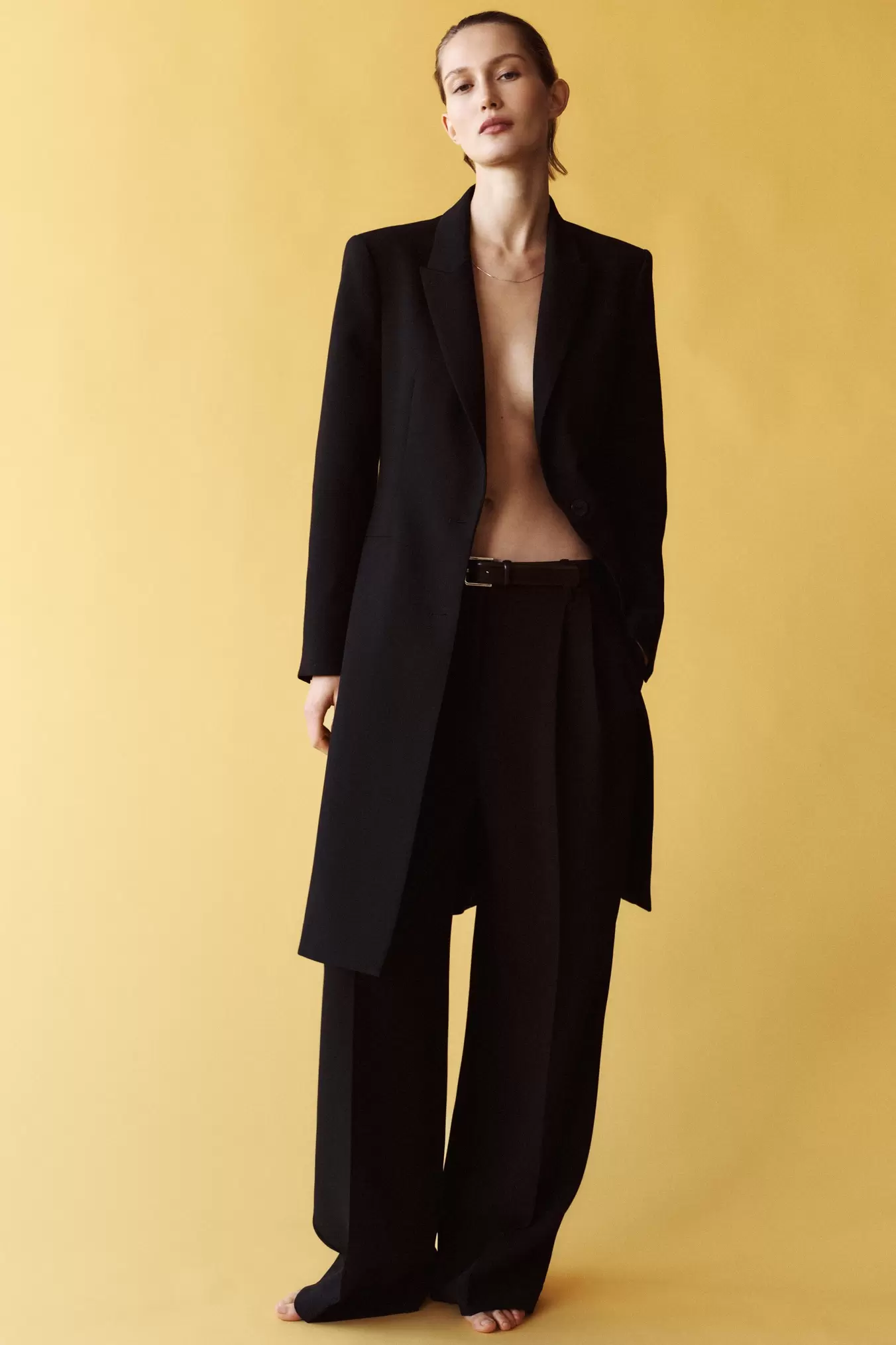 LONG BLAZER WITH SHOULDER PADS offers at 429 Dhs in Zara