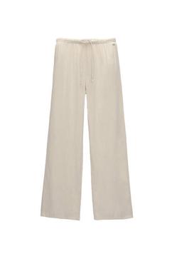 Rustic linen blend trousers offers at 169 Dhs in Pull & Bear