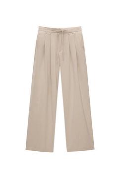 Flowing pinstripe trousers with darts offers at 129 Dhs in Pull & Bear