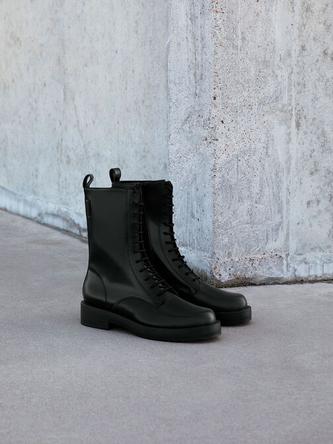 Lace-Up Calf Boots               - black box offers at 450 Dhs in Charles & Keith