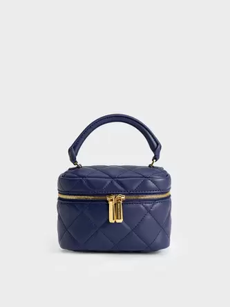 Quilted Vanity Pouch  - navy offers at 300 Dhs in Charles & Keith