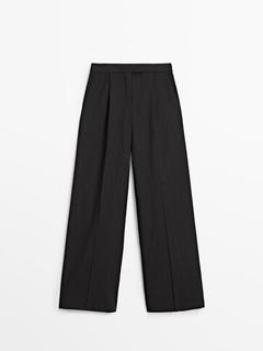 Wide-leg pinstripe trousers offers at 599 Dhs in Massimo Dutti