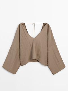 Blouse with back drawstring detail - Limited Edition offers at 1099 Dhs in Massimo Dutti