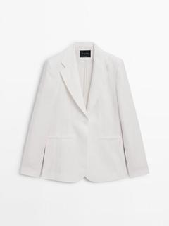 100% linen suit blazer offers at 1099 Dhs in Massimo Dutti