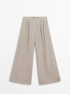 100% linen waffle-knit wide-leg trousers offers at 599 Dhs in Massimo Dutti