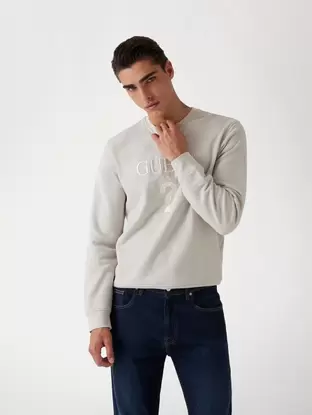 Front logo sweatshirt offers at 70 Dhs in Guess